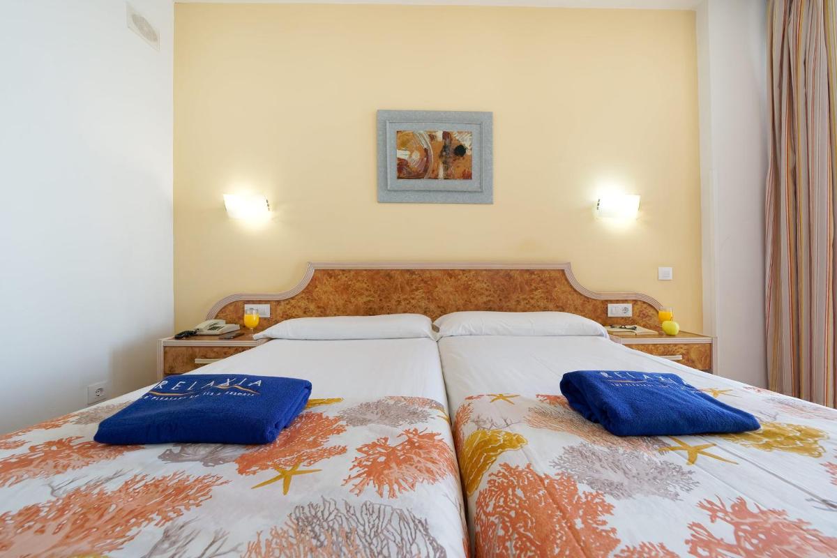 Cama o camas de una habitación en Relaxia Beverly Park