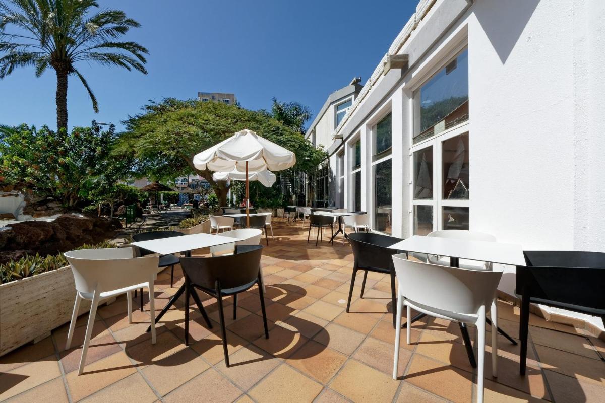 Un restaurante o sitio para comer en Relaxia Beverly Park
