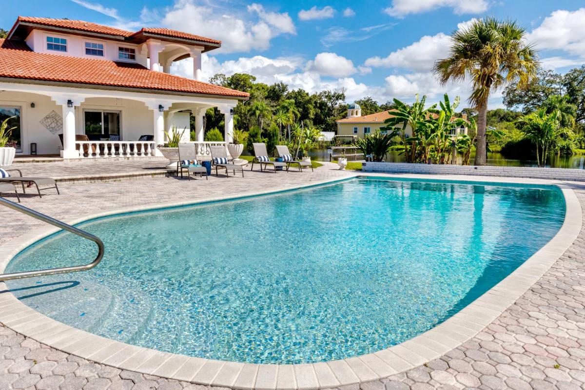 do not activate - The Belleair Estate - Breathtaking Waterfront Oasis with Private Pool - Housity