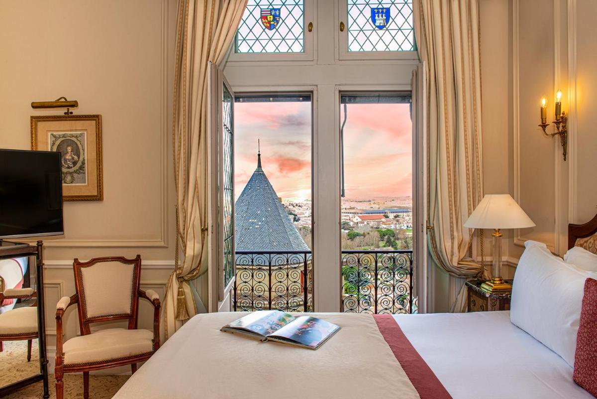 Un ou plusieurs lits dans un hébergement de l'établissement Hotel de la Cité Carcassonne - MGallery Collection