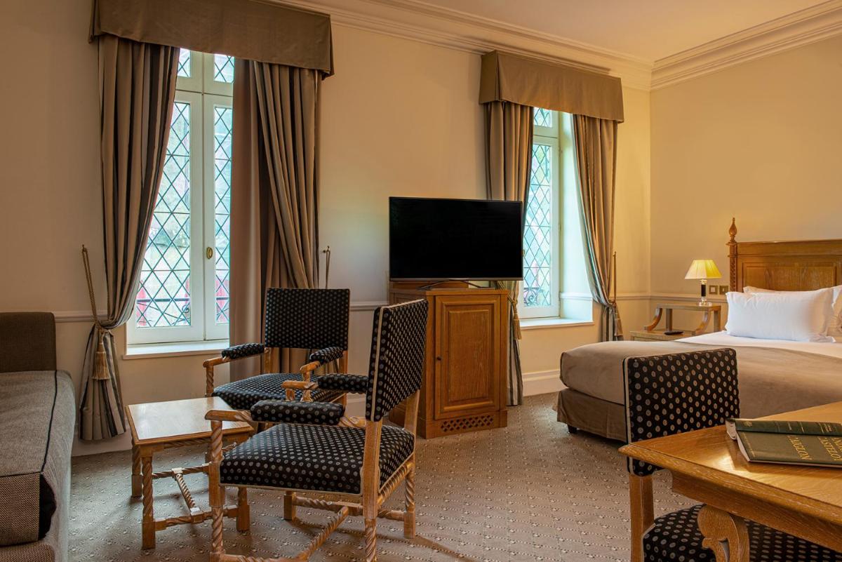 Télévision ou salle de divertissement dans l'établissement Hotel de la Cité Carcassonne - MGallery Collection
