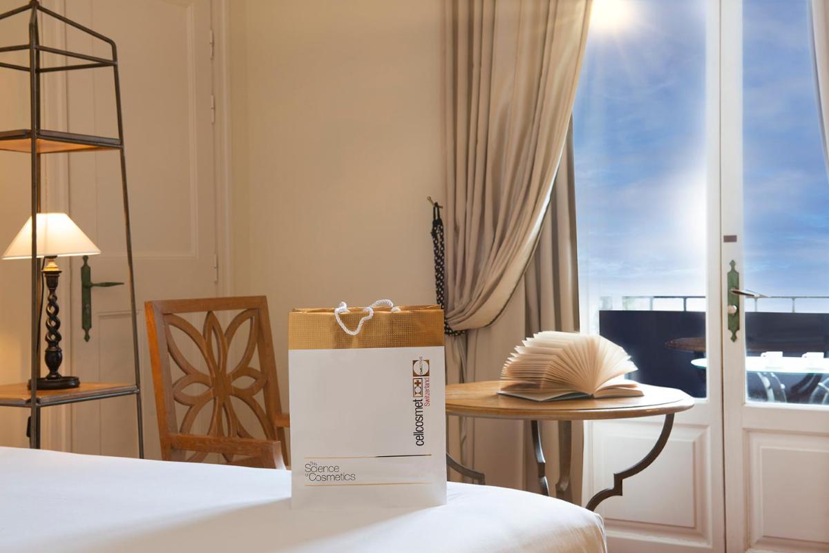 Un ou plusieurs lits dans un hébergement de l'établissement Hotel de la Cité Carcassonne - MGallery Collection