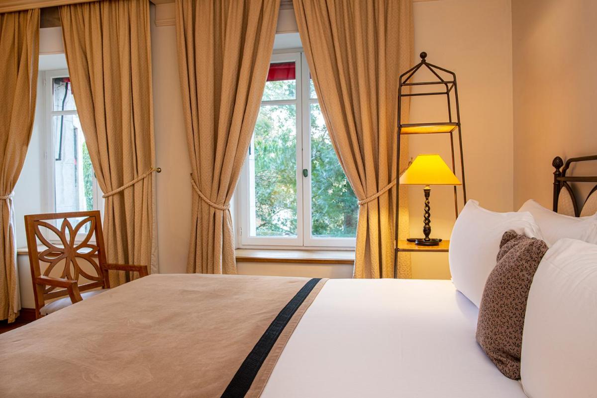 Un ou plusieurs lits dans un hébergement de l'établissement Hotel de la Cité Carcassonne - MGallery Collection