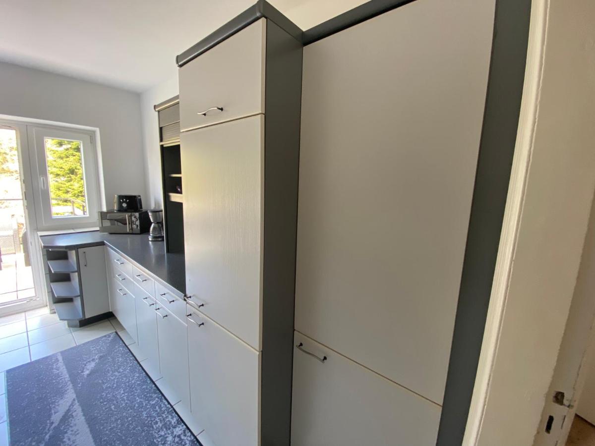 Suitetrails - Ferienwohnung mit Balkon und Garten OG