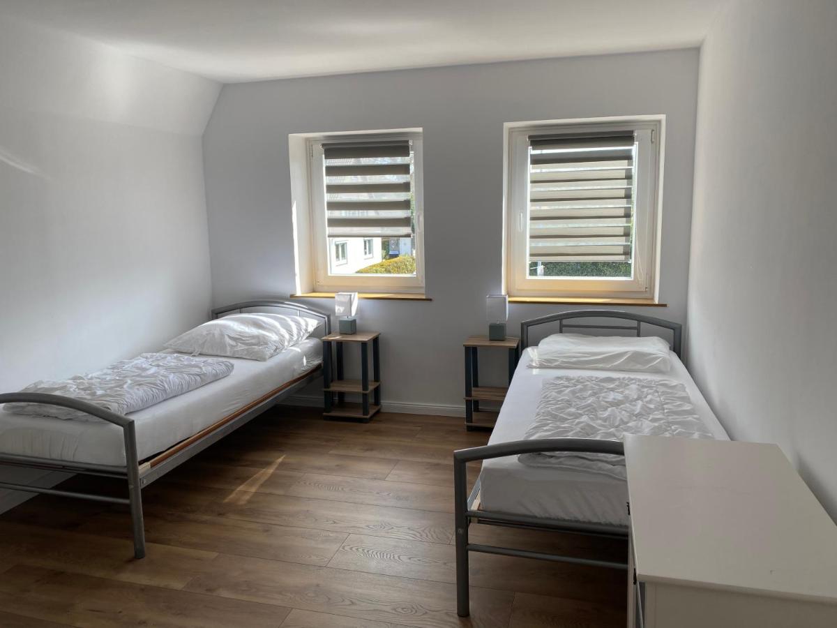Suitetrails - Ferienwohnung mit Balkon und Garten OG