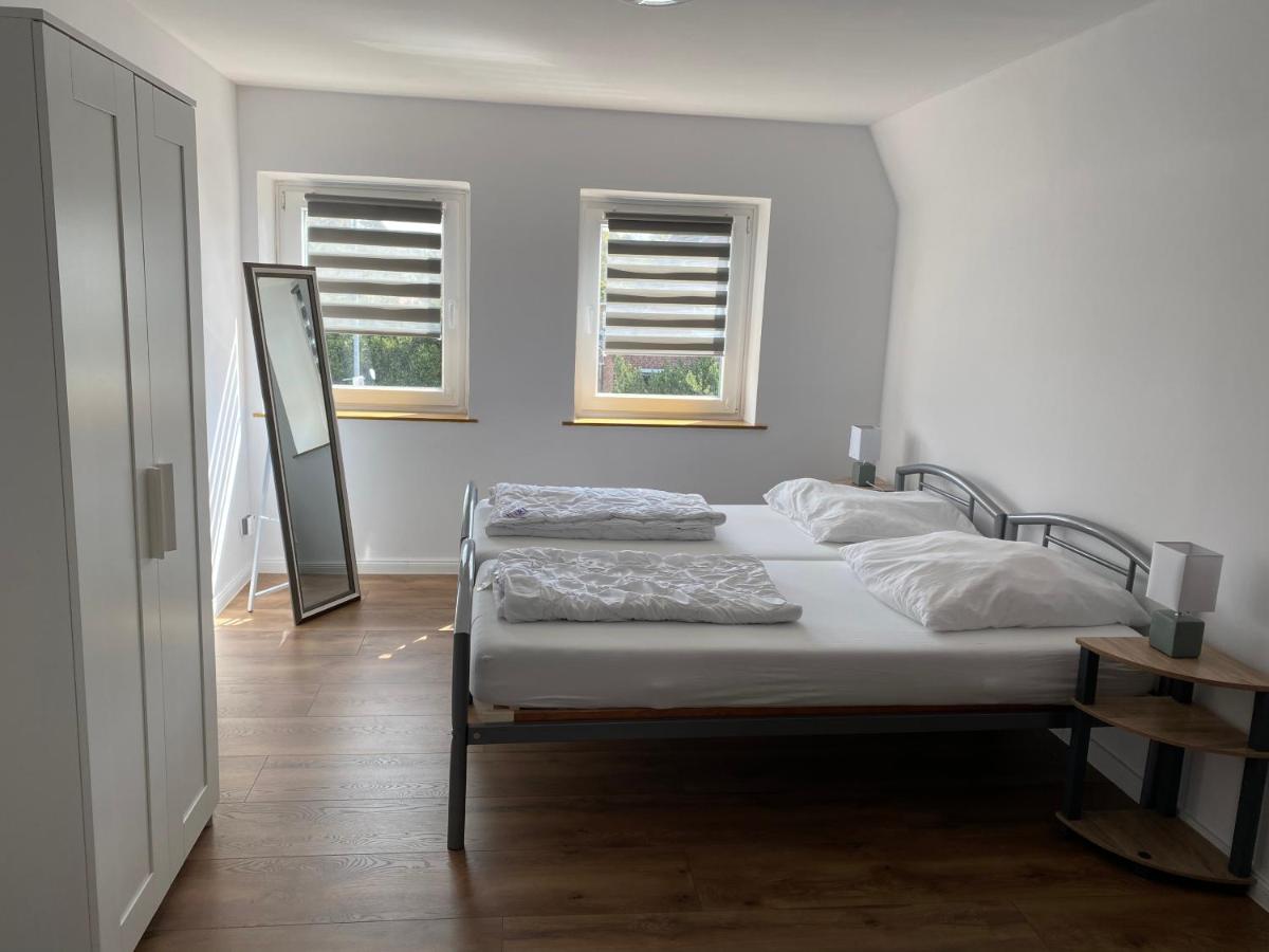 Suitetrails - Ferienwohnung mit Balkon und Garten OG