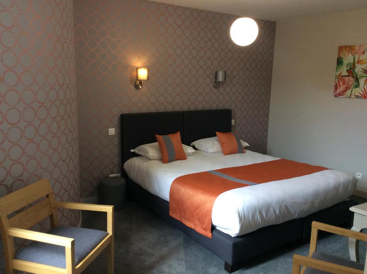 Un ou plusieurs lits dans un hébergement de l'établissement Hôtel 4 étoiles - Restaurants & Spa Périer Du Bignon