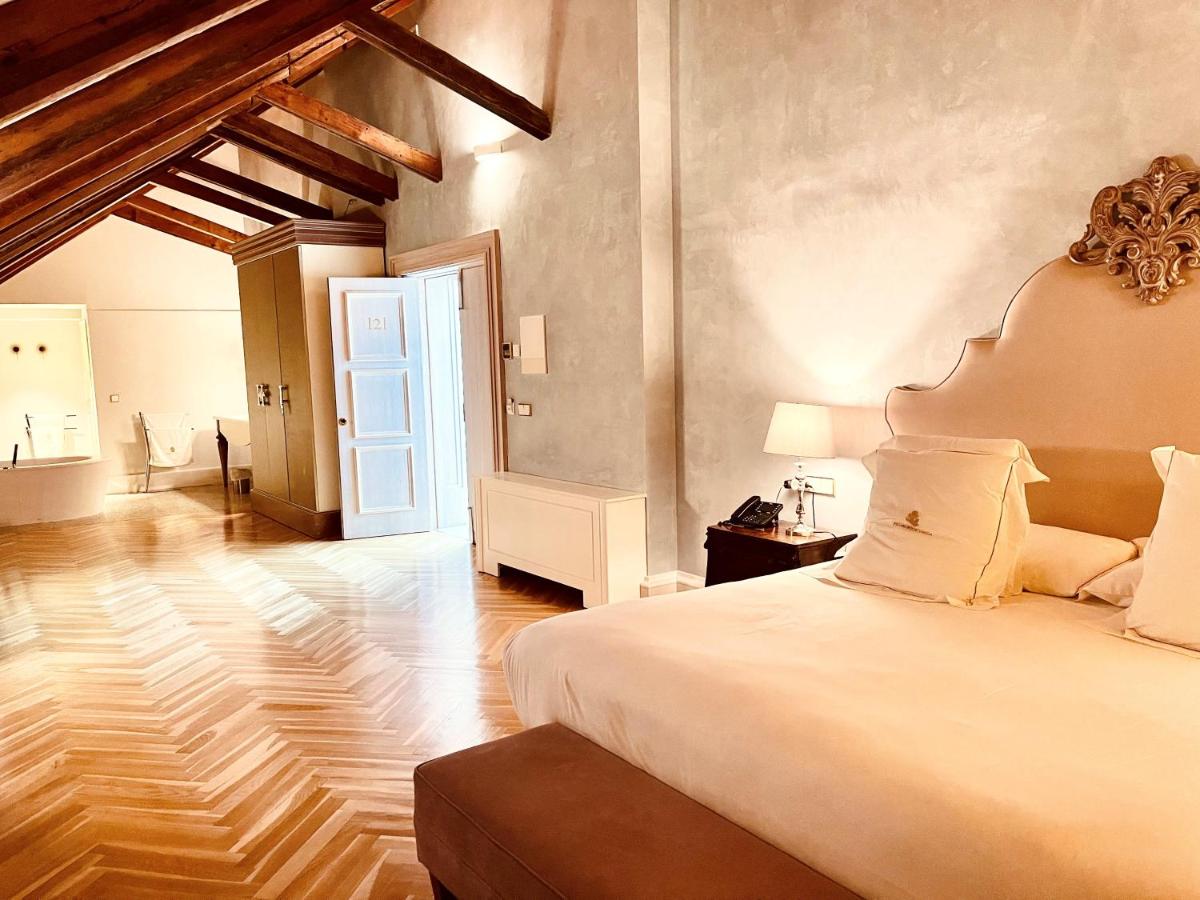 Cama o camas de una habitación en Hotel Palacio De Úbeda 5 G.L