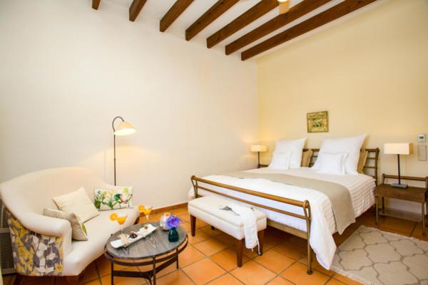 Cama o camas de una habitación en Casa Font i Roig