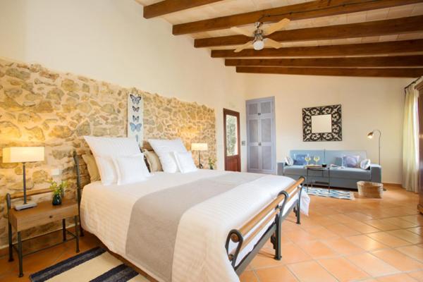 Cama o camas de una habitación en Casa Font i Roig