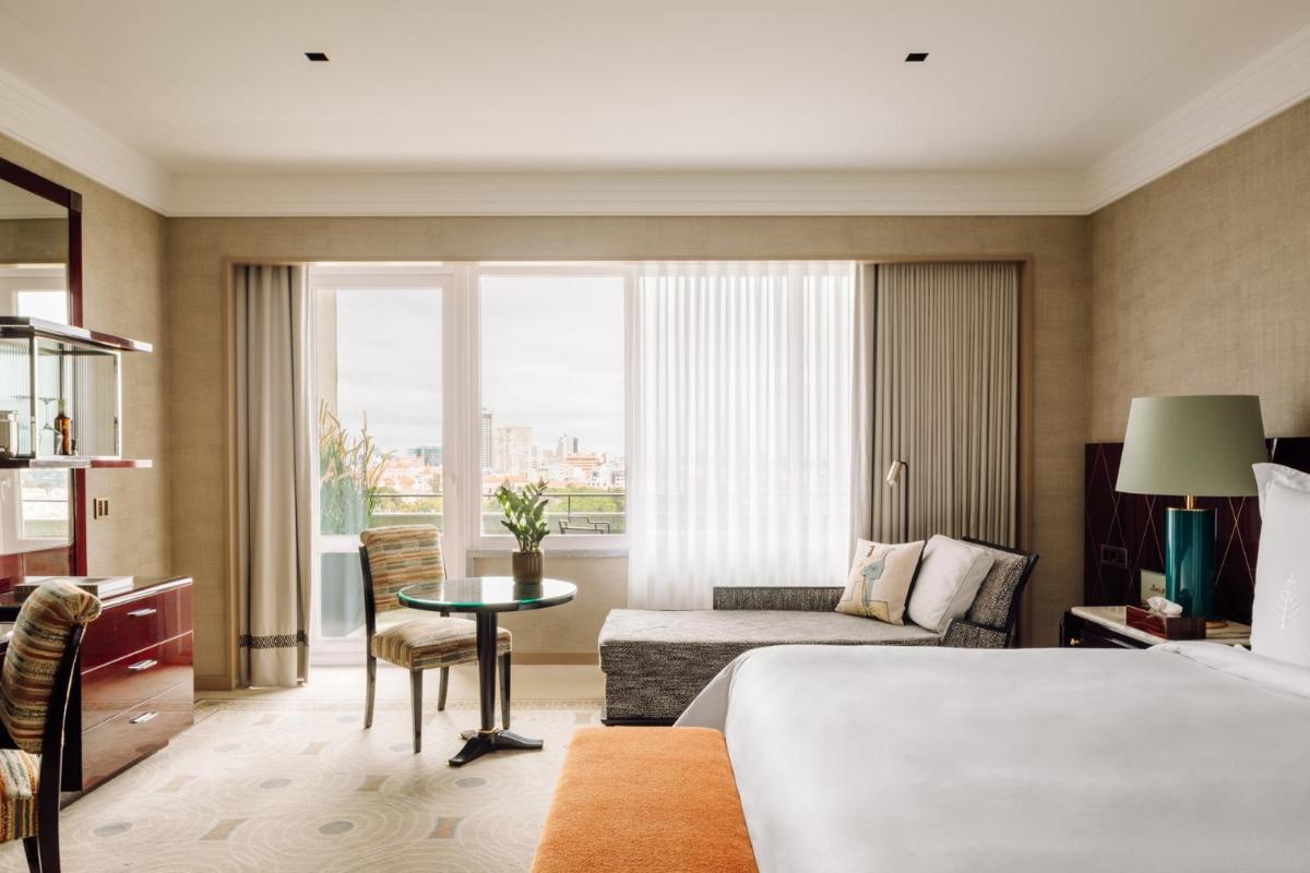 Uma cama ou camas num quarto em Four Seasons Hotel Ritz Lisbon