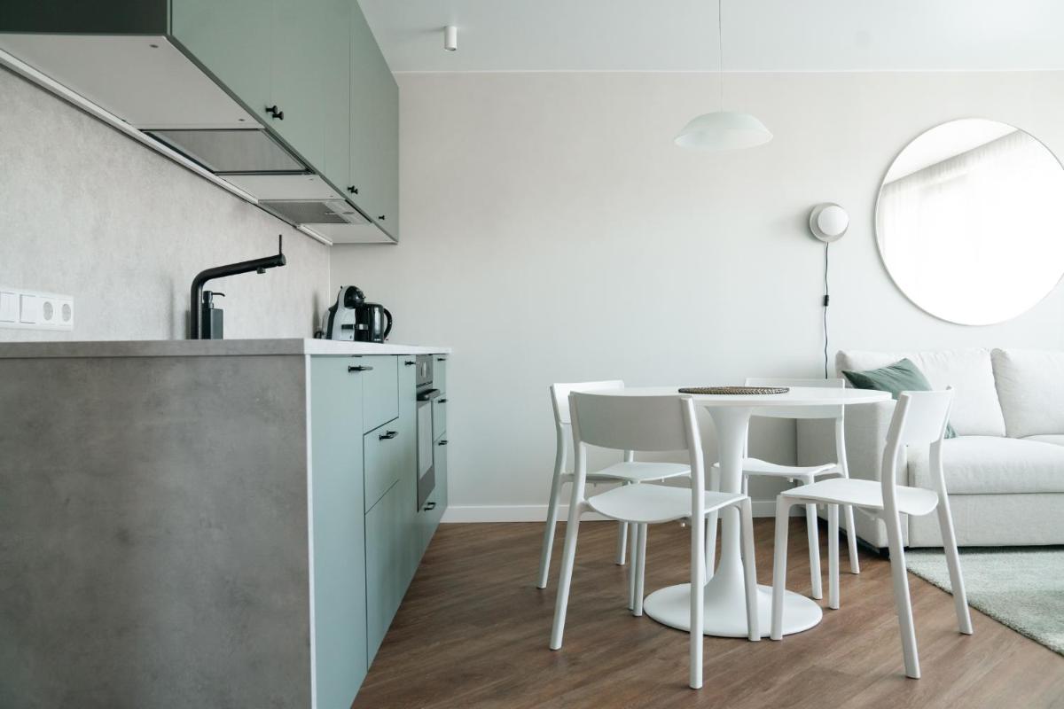 Grey Green Cozy Apartment - Housity