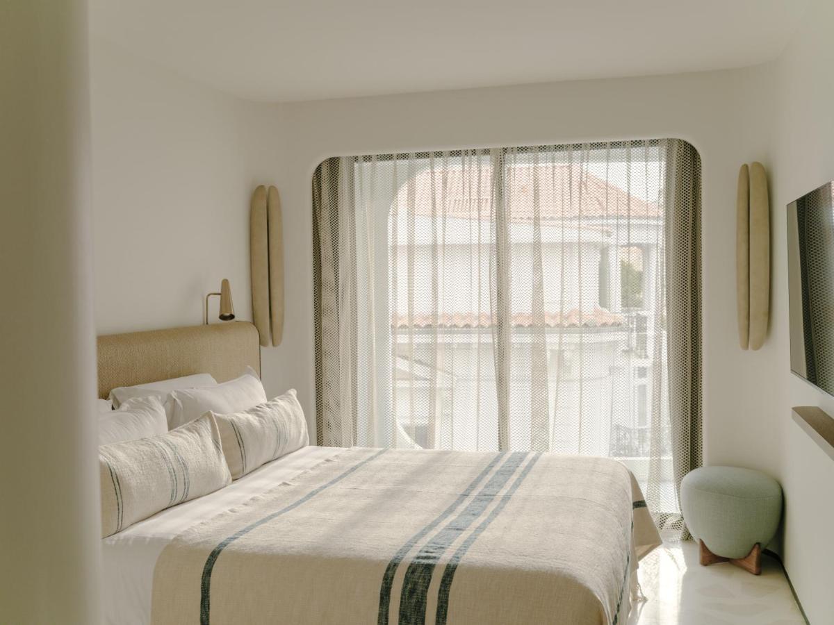 Un ou plusieurs lits dans un hébergement de l'établissement Hôtel & Spa Belle Plage