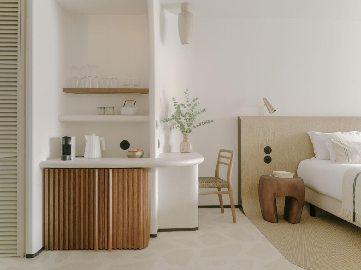 Un ou plusieurs lits dans un hébergement de l'établissement Hôtel & Spa Belle Plage