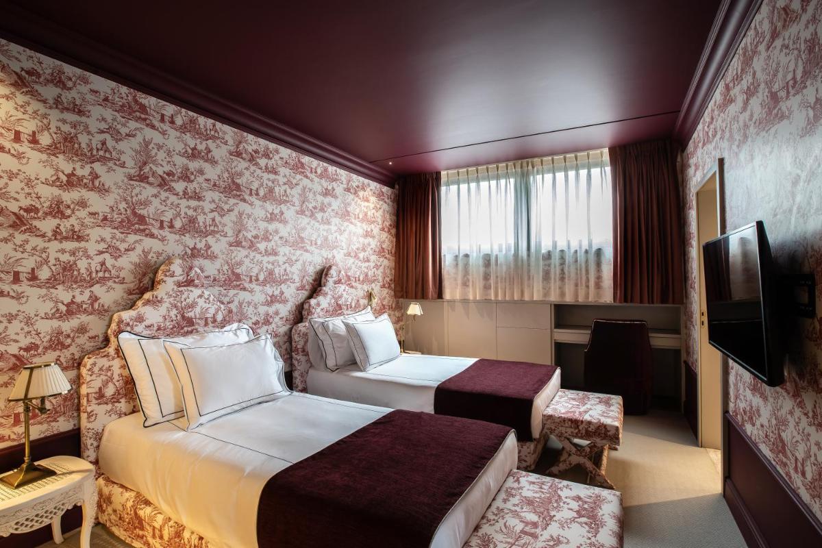 Uma cama ou camas num quarto em Vinha Boutique Hotel - The Leading Hotels of the World