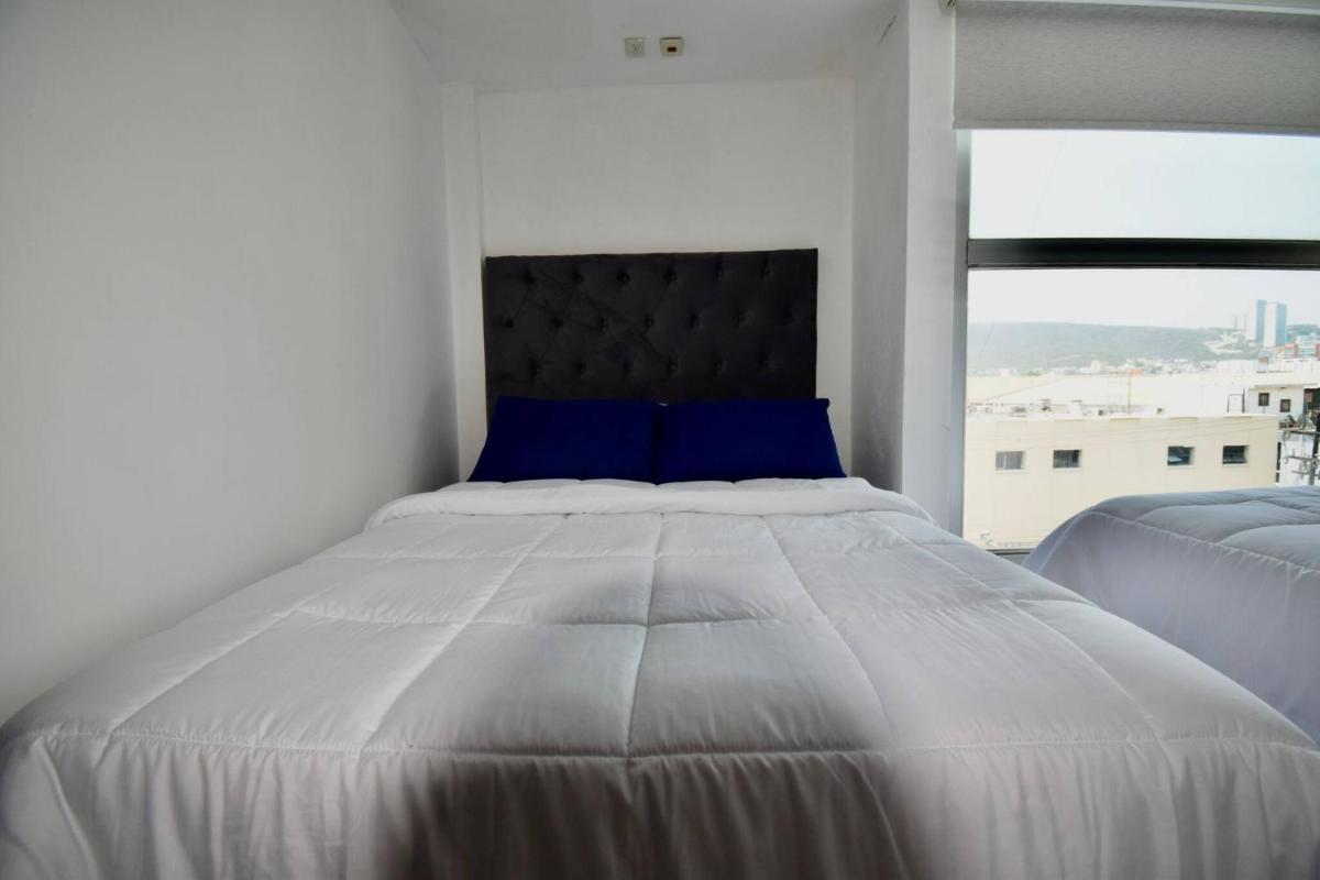 Room in Guest room - Habitacion Tipo Hotel En Obispado - Housity