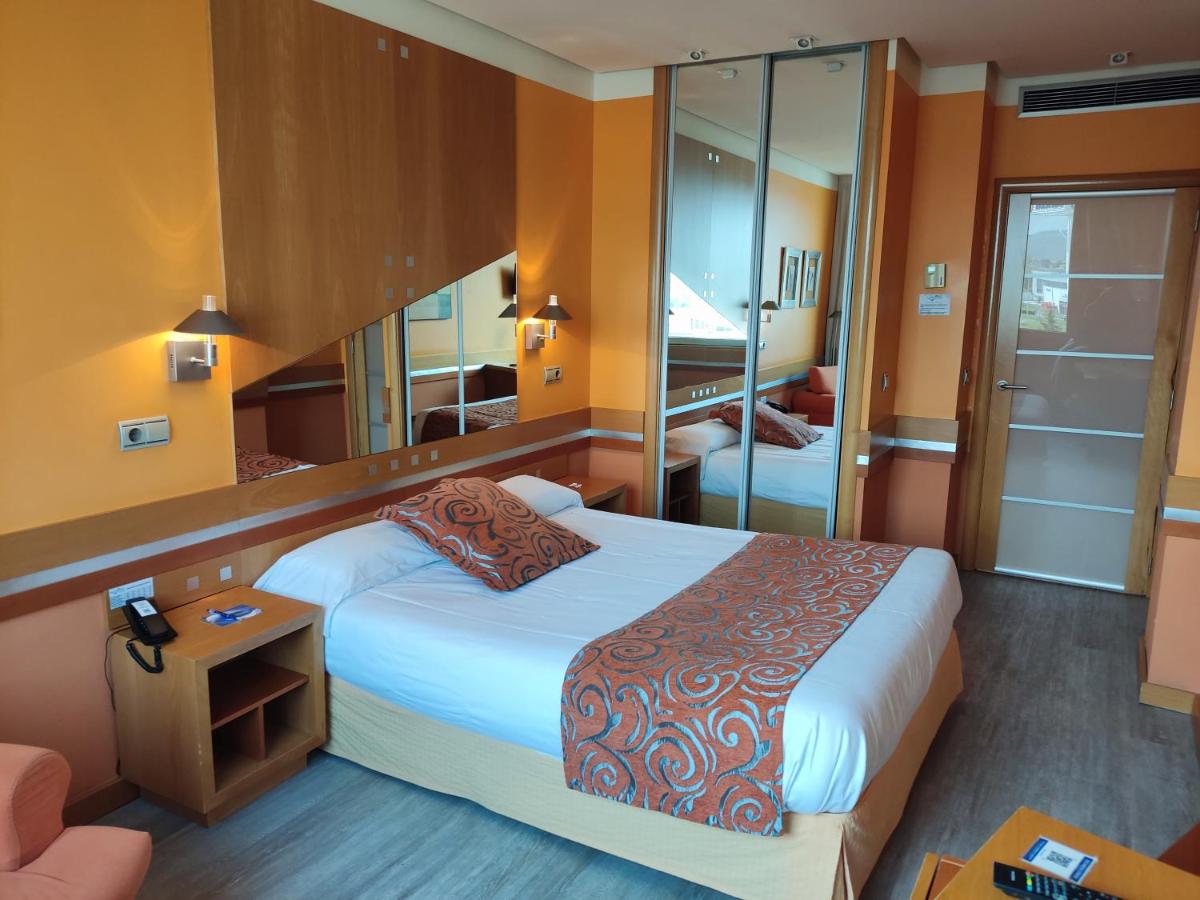 Cama o camas de una habitación en Hotel Torresport
