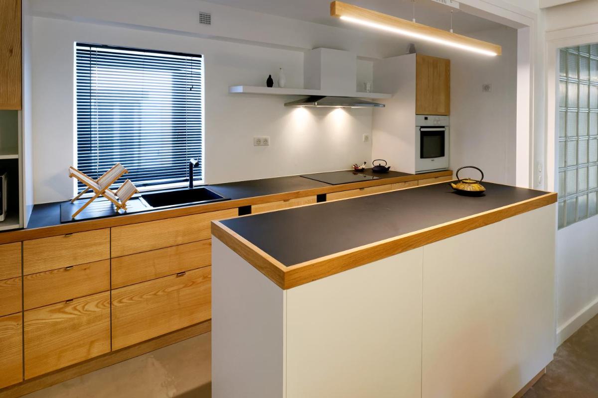 Cuisine ou kitchenette dans l'établissement Ty Mad