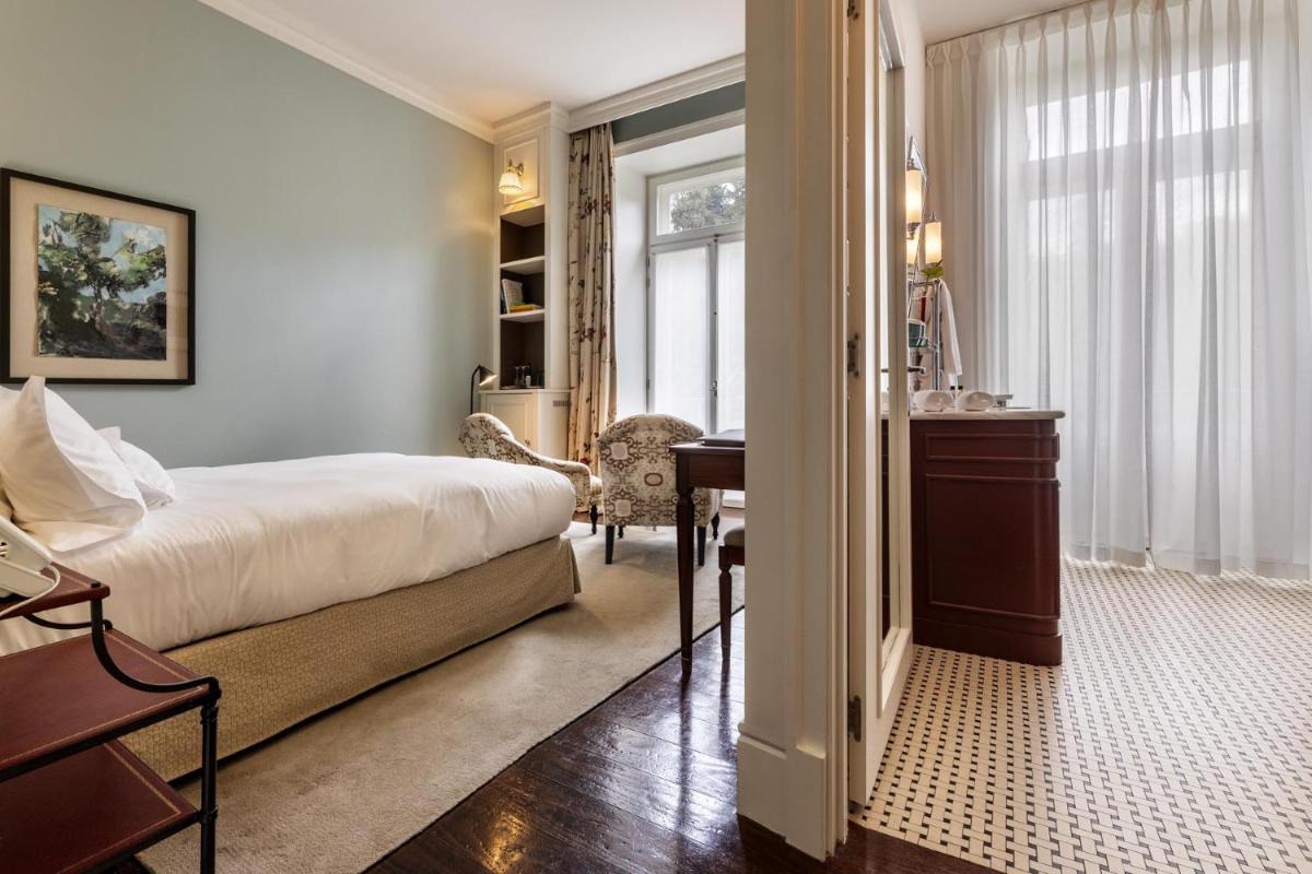 Uma cama ou camas num quarto em Vidago Palace