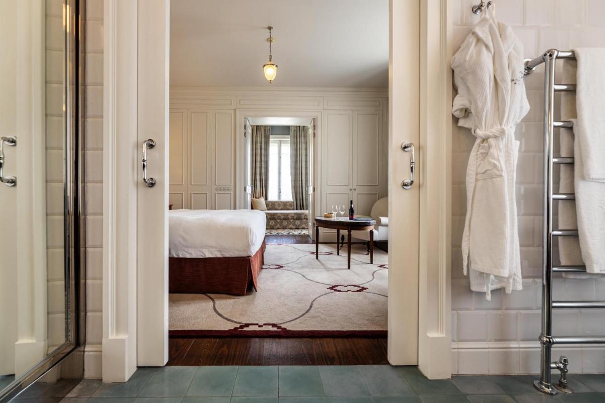Uma cama ou camas num quarto em Vidago Palace