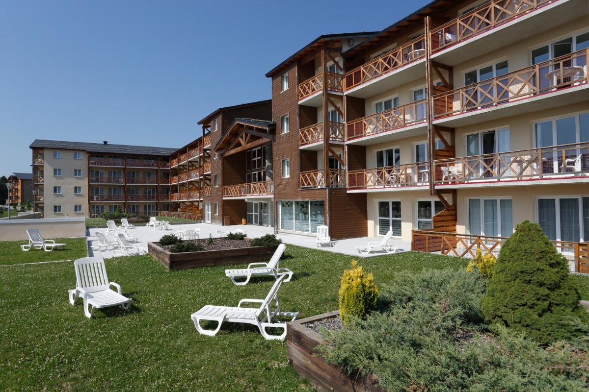 Jardin de l'établissement Vacancéole - Appart'Vacances Pyrénées 2000