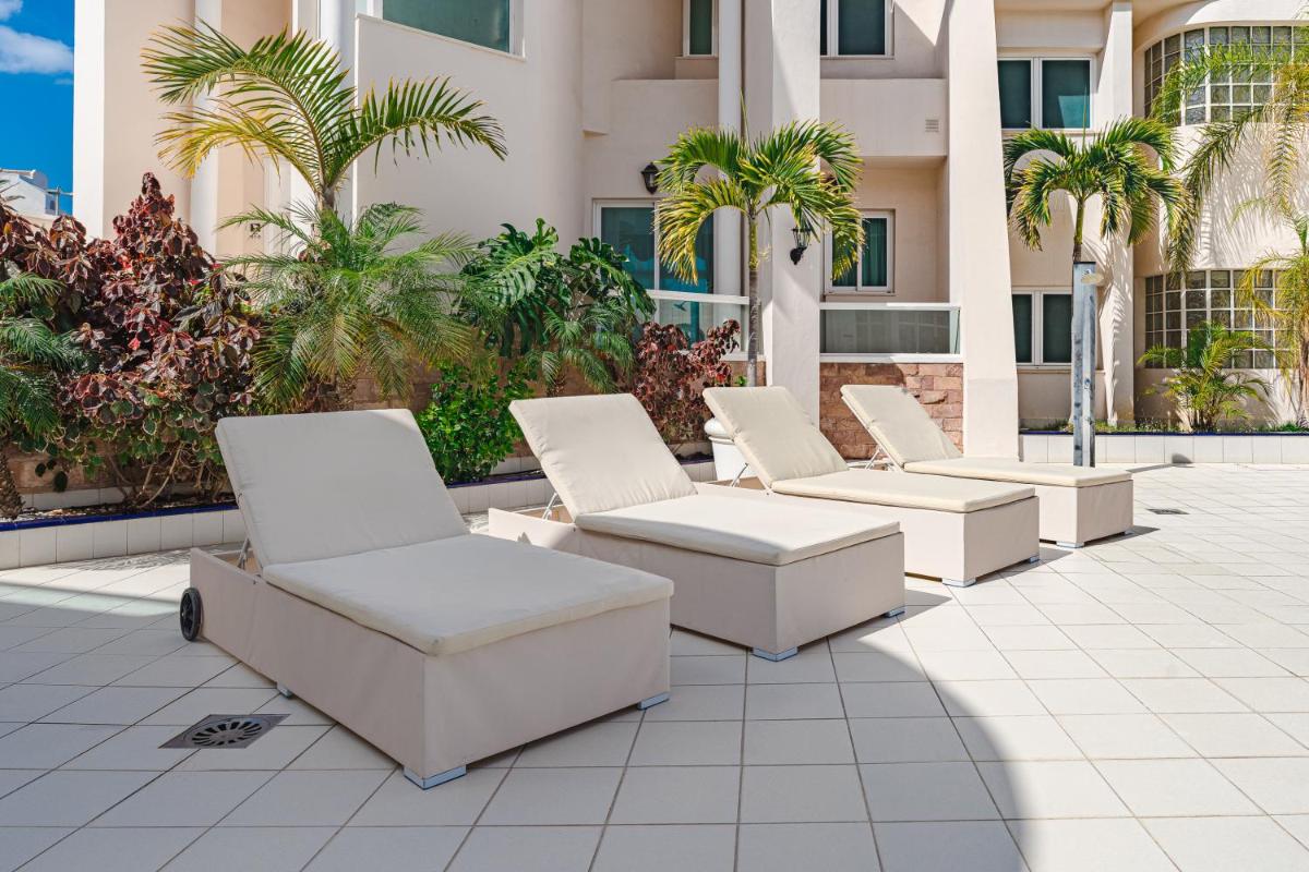 Zona de estar de Flamingo Suites Boutique Hotel