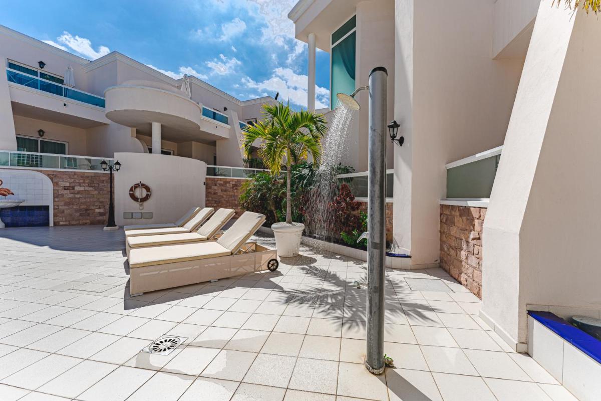 Un balcón o terraza de Flamingo Suites Boutique Hotel