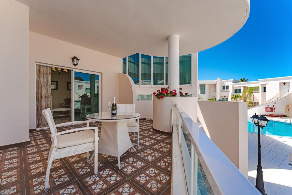 Un balcón o terraza de Flamingo Suites Boutique Hotel