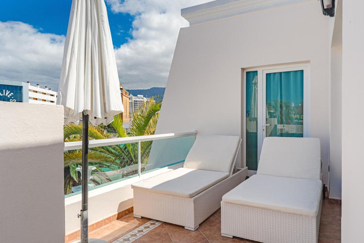 Un balcón o terraza de Flamingo Suites Boutique Hotel