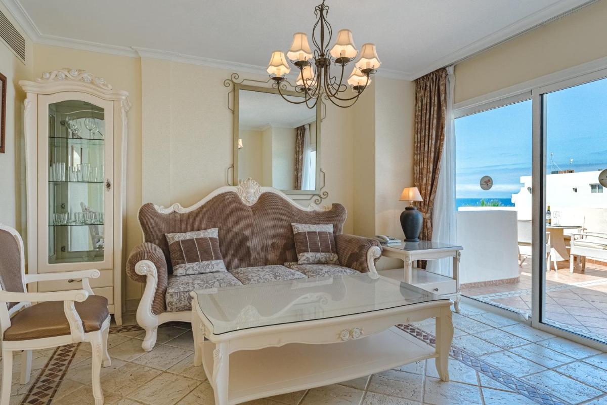 Zona de estar de Flamingo Suites Boutique Hotel