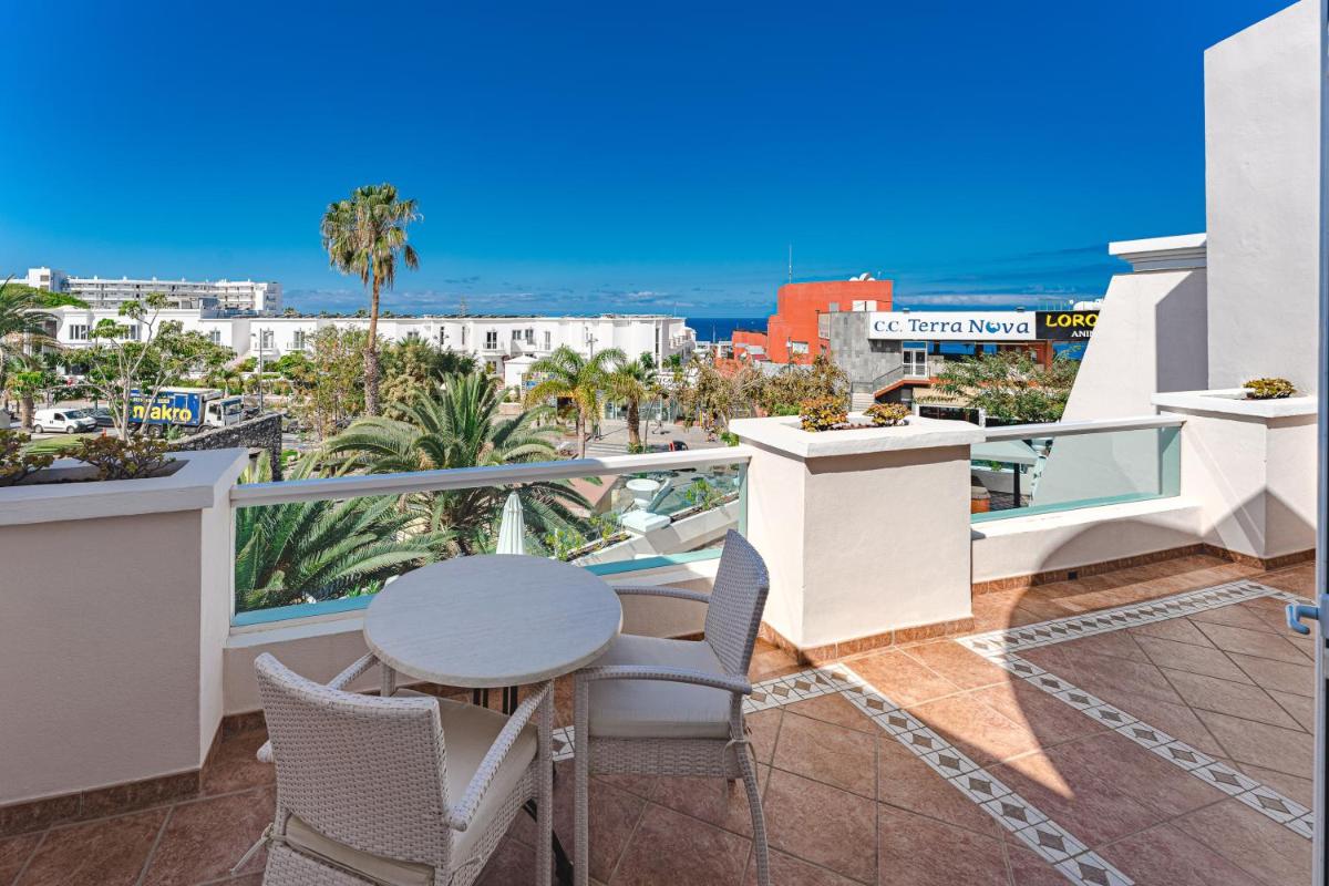 Un balcón o terraza de Flamingo Suites Boutique Hotel
