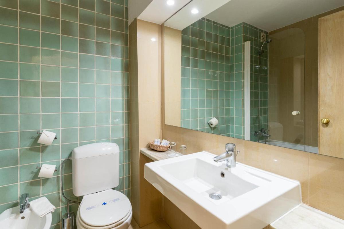 Uma casa de banho em Boa Vista Hotel & Spa - Adults Only