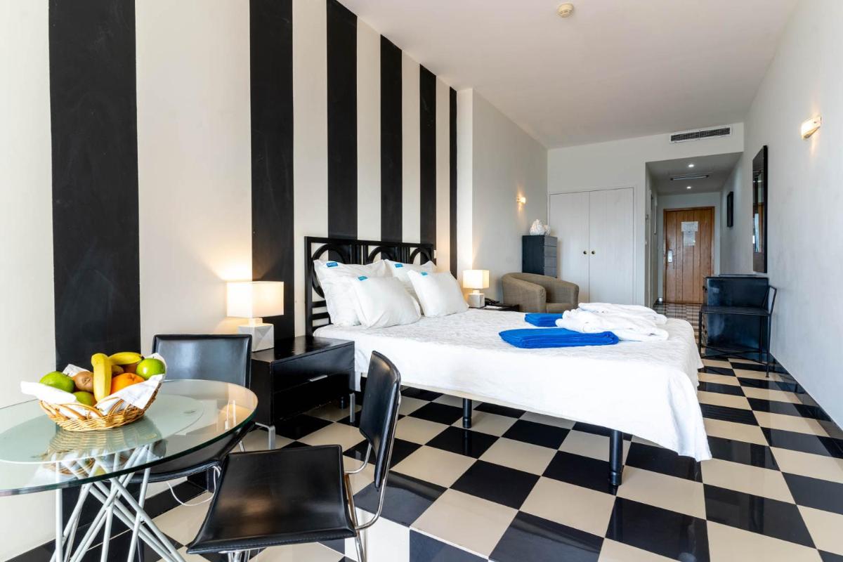 Uma cama ou camas num quarto em Boa Vista Hotel & Spa - Adults Only