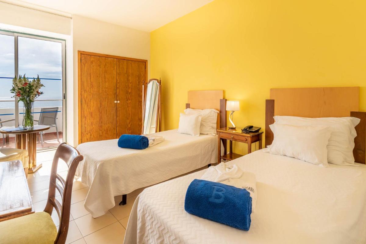 Uma cama ou camas num quarto em Boa Vista Hotel & Spa - Adults Only