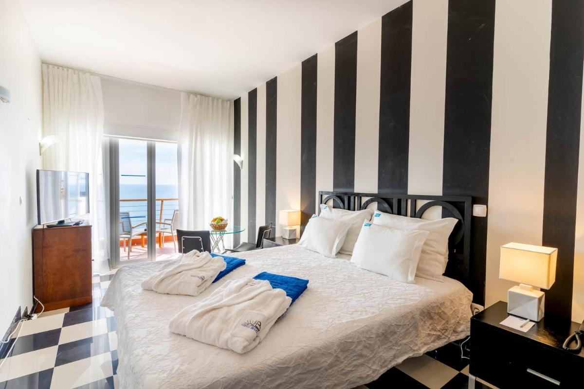 Uma cama ou camas num quarto em Boa Vista Hotel & Spa - Adults Only