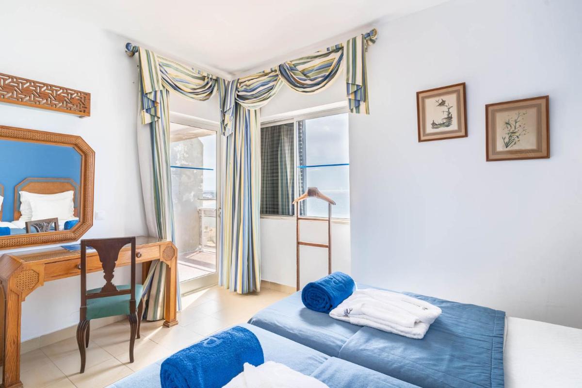 Uma cama ou camas num quarto em Boa Vista Hotel & Spa - Adults Only