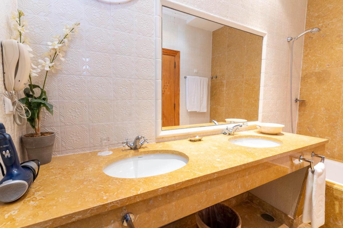 Uma casa de banho em Boa Vista Hotel & Spa - Adults Only