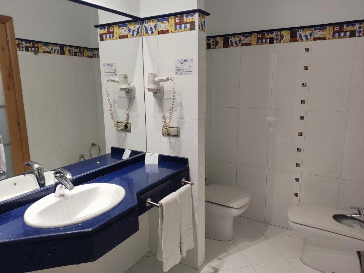 Un baño de Hotel Torresport