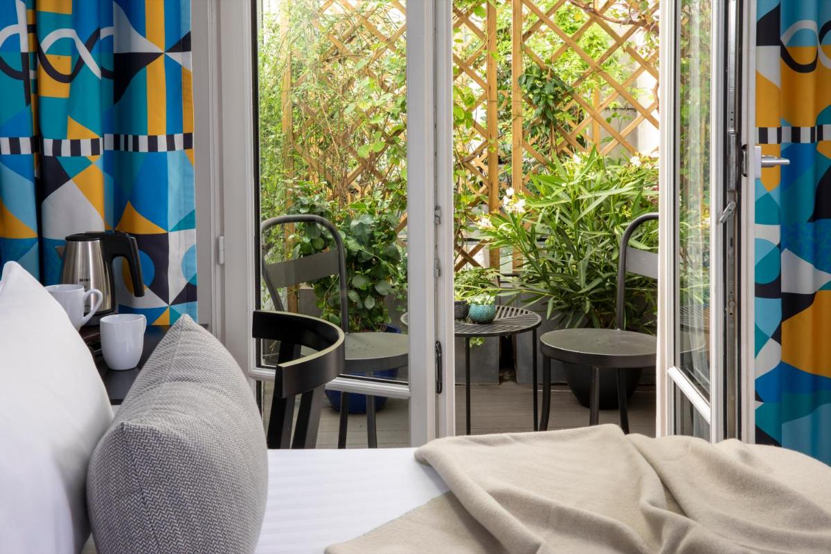 Coin salon dans l'établissement Les Matins de Paris & Spa