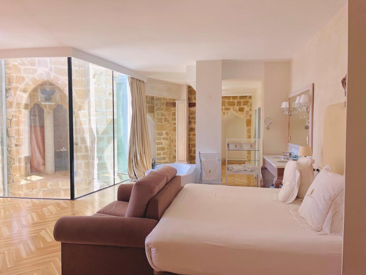 Cama o camas de una habitación en Hotel Palacio De Úbeda 5 G.L