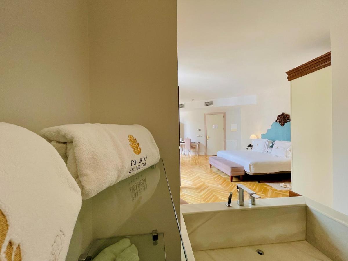 Cama o camas de una habitación en Hotel Palacio De Úbeda 5 G.L