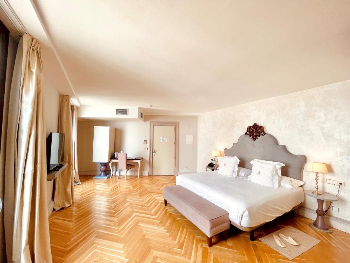 Cama o camas de una habitación en Hotel Palacio De Úbeda 5 G.L