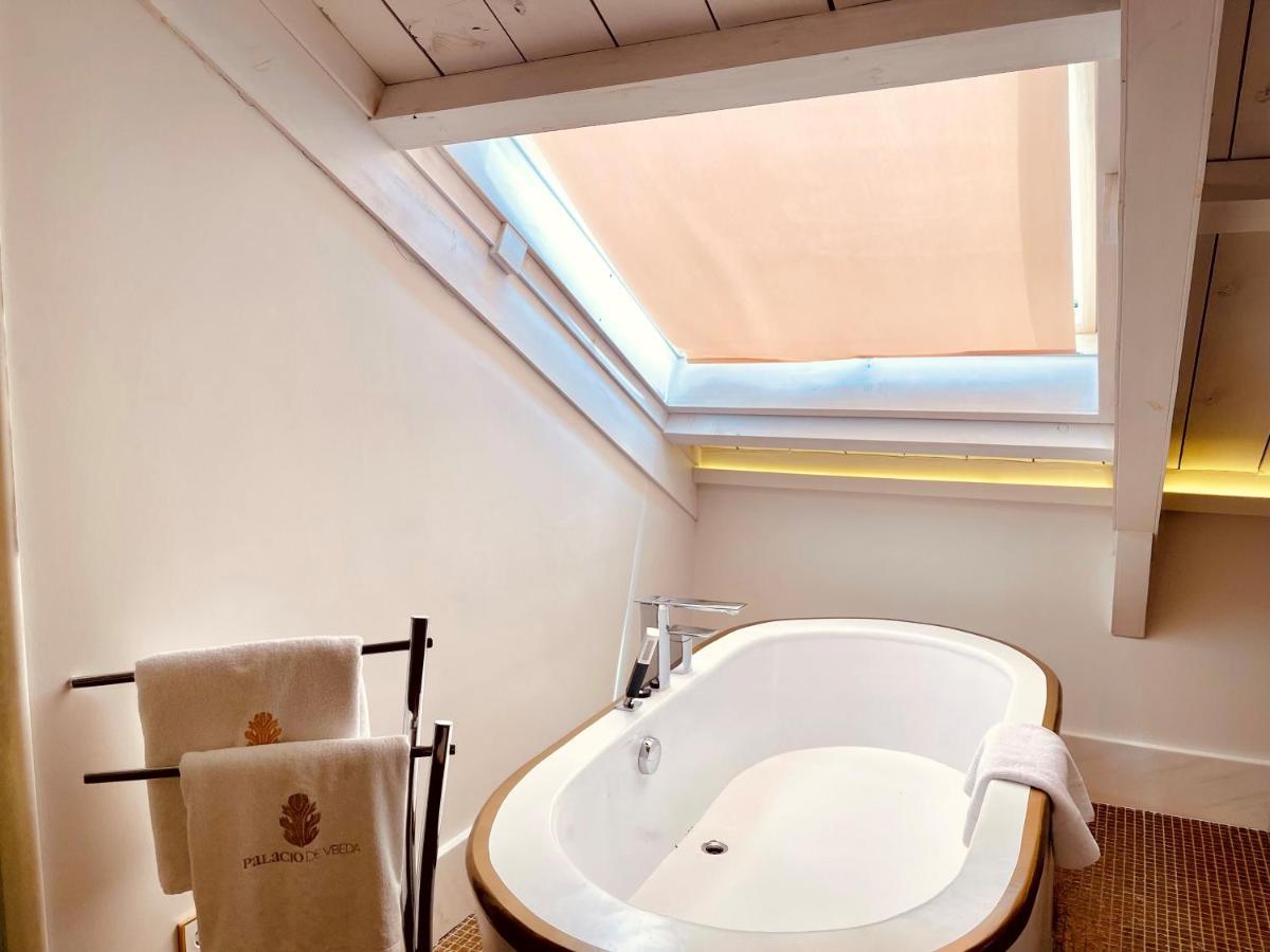 Un baño de Hotel Palacio De Úbeda 5 G.L