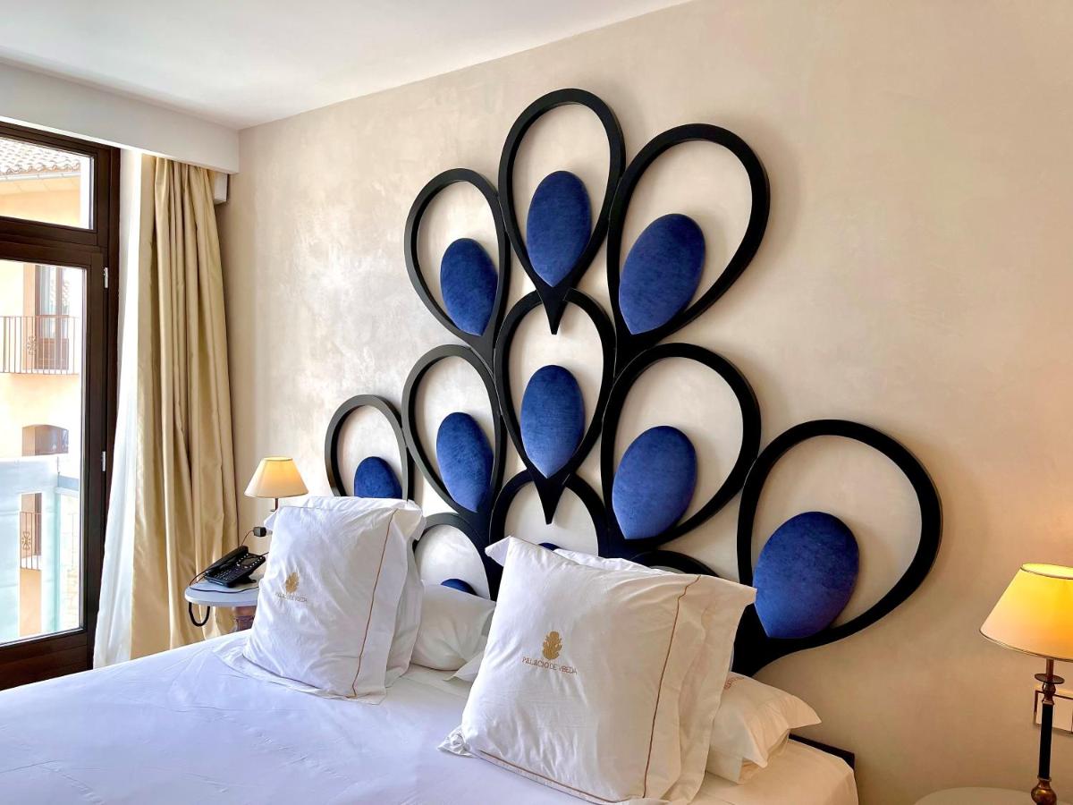 Cama o camas de una habitación en Hotel Palacio De Úbeda 5 G.L
