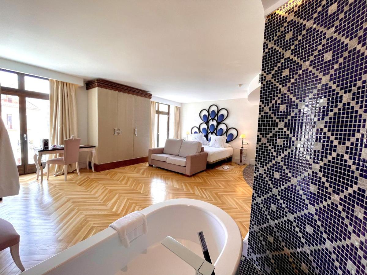 Cama o camas de una habitación en Hotel Palacio De Úbeda 5 G.L