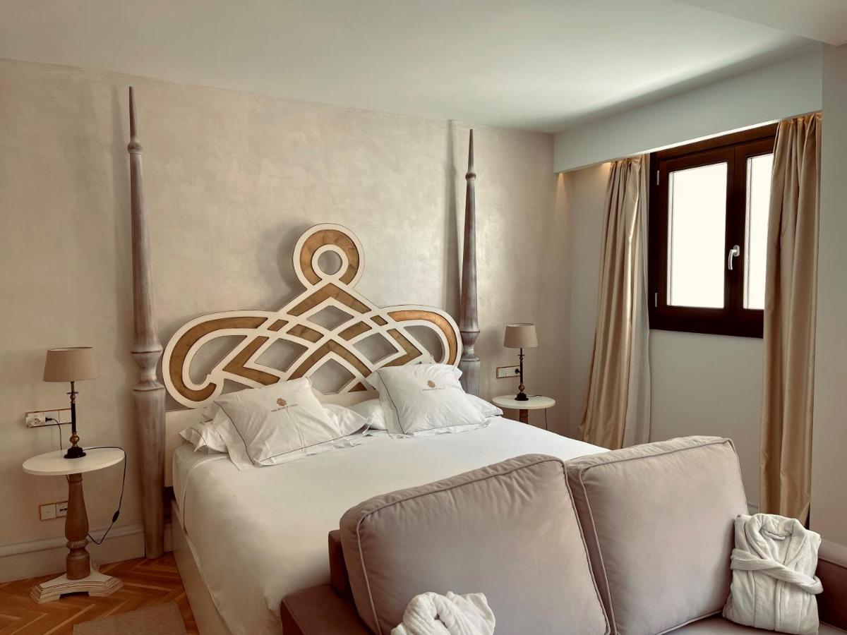 Cama o camas de una habitación en Hotel Palacio De Úbeda 5 G.L
