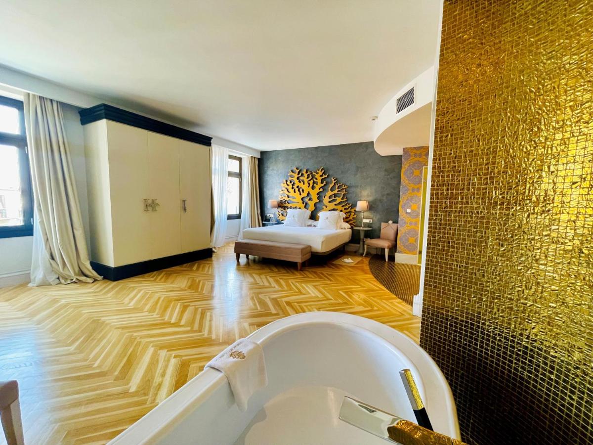 Cama o camas de una habitación en Hotel Palacio De Úbeda 5 G.L
