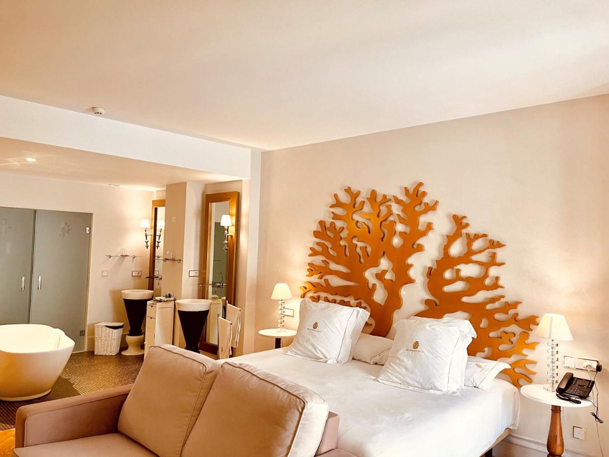 Cama o camas de una habitación en Hotel Palacio De Úbeda 5 G.L