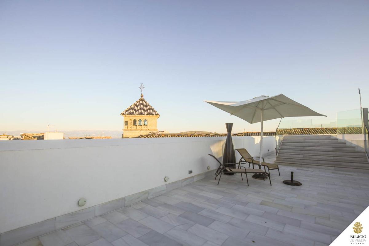 Un balcón o terraza de Hotel Palacio De Úbeda 5 G.L