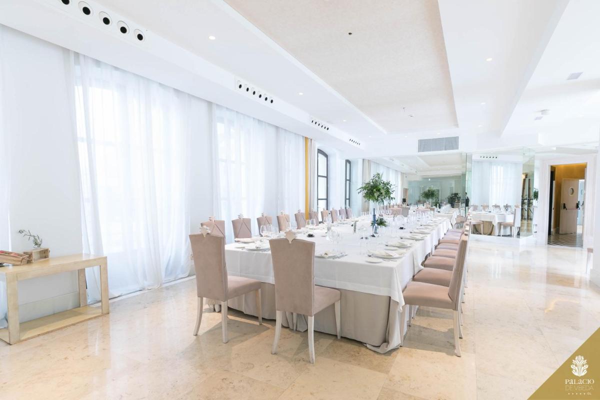 Zona de estar de Hotel Palacio De Úbeda 5 G.L